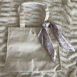 VICTORIA'S SECRET OFF WHITE BAG W/ PURPLE FLORAL SCARF NEW WITH TAGS "FLAW"